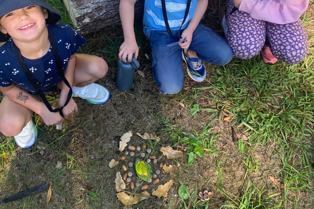 Children creating nature arts and crafts at Woodhouse