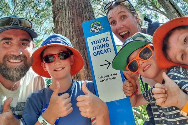 Family enjoying a day of adventure on Challenge Hill at Woodhouse Adventure Park